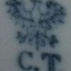 Sygnatura C.T. z niebieskim orłem